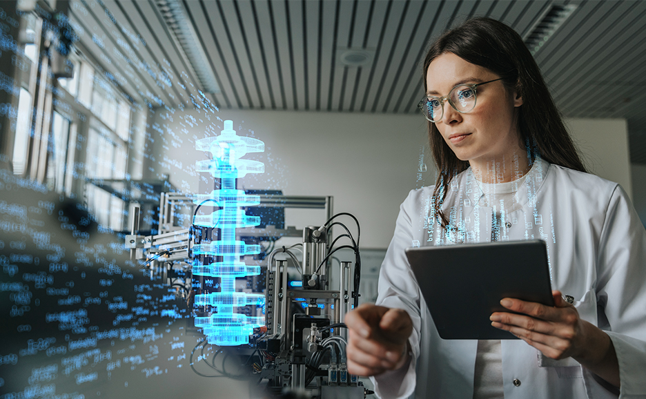 A female engineer uses a tablet to review a digital twin in an AI-powered intelligent manufacturing environment.