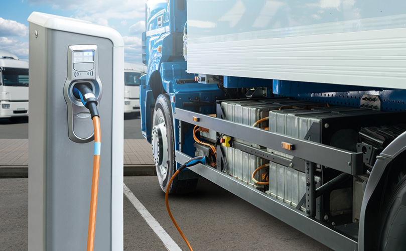 Electric truck with charging station