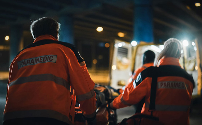 Paramedics transporting patients