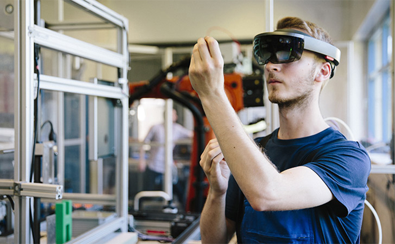 Image of a man wearing VR goggles