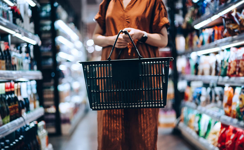 Image of a woman shopping at a supermarket