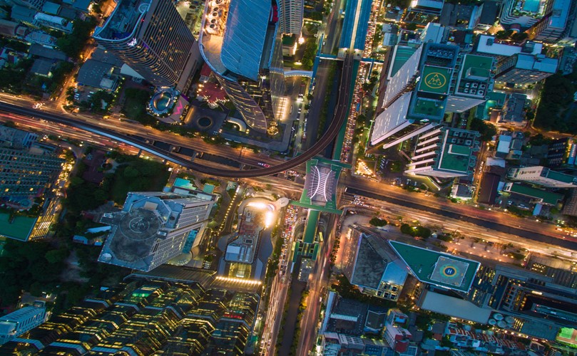 High-angle view of traffic on city streets with lighting